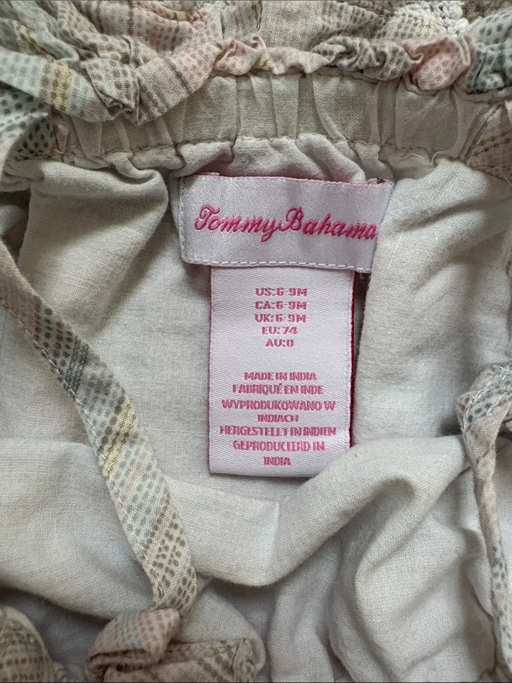 Tommy Bahama Cream Baby Romper with Pastel Stripe Accents